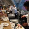 Roma Food&Wine Festival, giorno due: Marco Stabile (in primo piano) dell'Ora d'Aria di Firenze cucina il suo vitel palamit&egrave; mentre alle spalle Francesco Apreda dell'Imago dell'Hotel Hassler lavora al suo Cous cous indiano. Oggi e il turno di altri 6 (in realt&agrave; 9) assi: a pranzo&nbsp;Cristina Bowerman, Christian e Manuel Costardi, Alice Delcourt; a cena Fabrizio Ferrari, Gennaro Esposito, e le carbonare di Luciano Monosilio, Alessandro Roscioli e Nabil Hadj Hassen&nbsp;